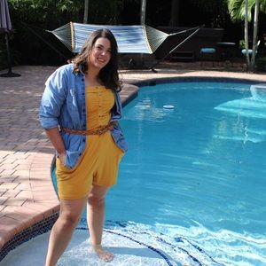 Strapless yellow romper with pockets